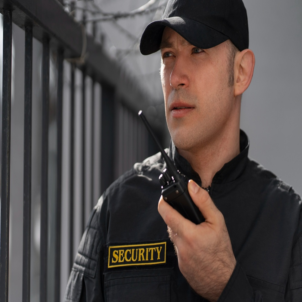 male-security-guard-with-radio-station